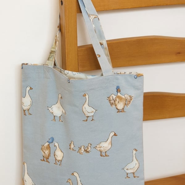 DUCKS ON BLUE SUSTAINABLE UNLINED TOTE BAG