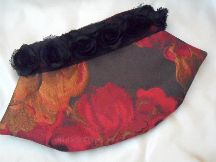 Evening clutch bag in red brocade
