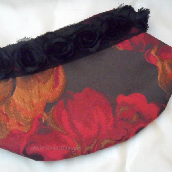 Evening clutch bag in red brocade