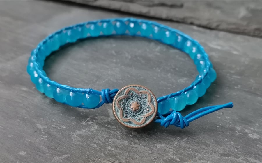 Blue leather and agate bead bracelet with decorative copper button 