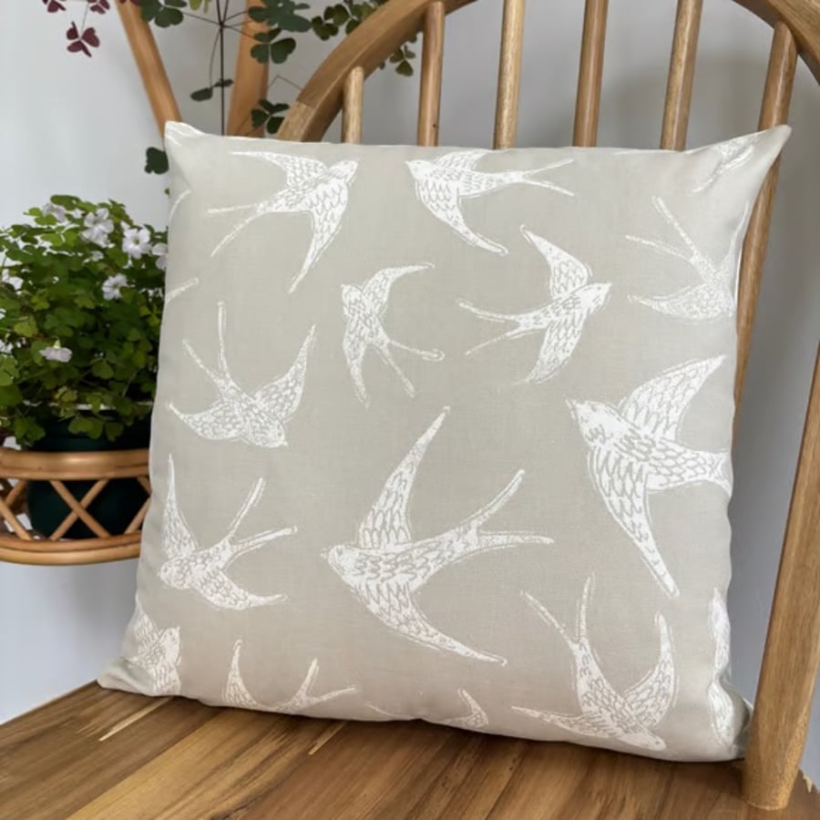Cushion cover with a bird print in taupe and ivory, 40cm x 40cm