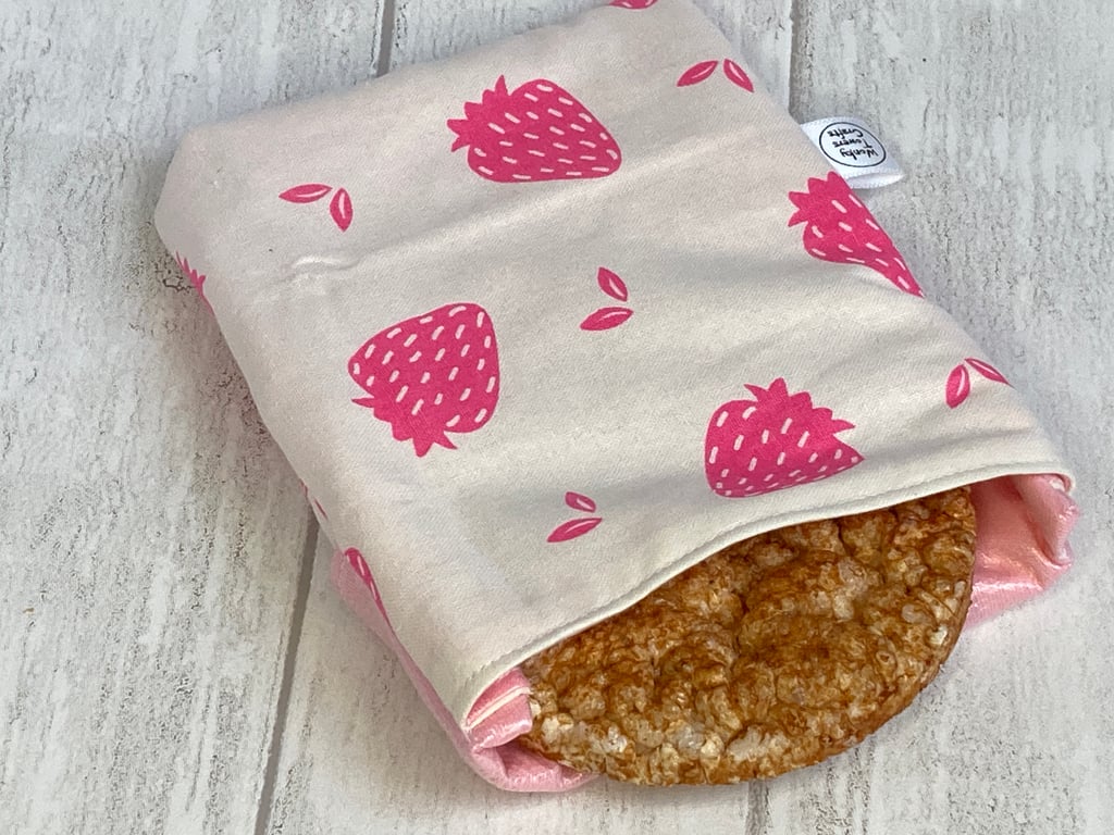 Reusable snack bag with food safe lining. Strawberries.