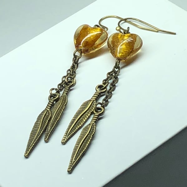 Golden honey Murano heart feather earrings