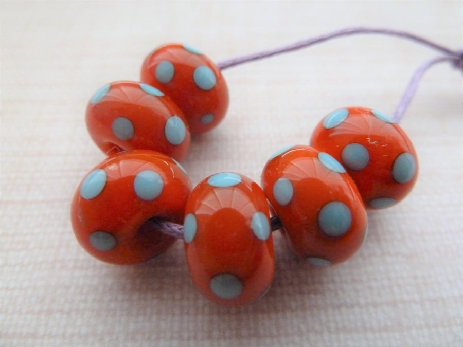 orange and blue polka dot lampwork glass beads