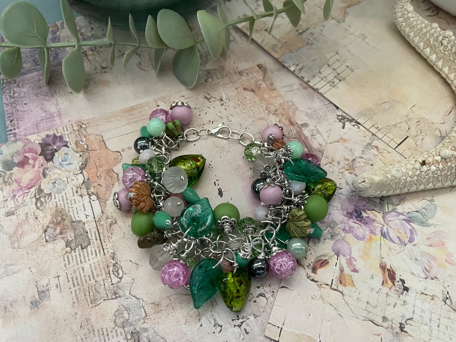 Charm bracelet Beautiful pink and green glass beaded adjustable charm bracelet 