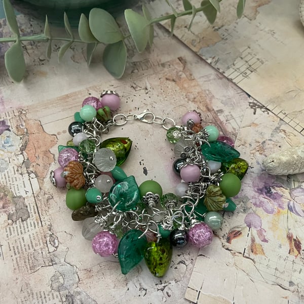 Charm bracelet Beautiful pink and green glass beaded adjustable charm bracelet 