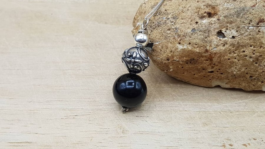 Black Onyx sphere Pendant necklace. December birthstone. Reiki jewelry. 