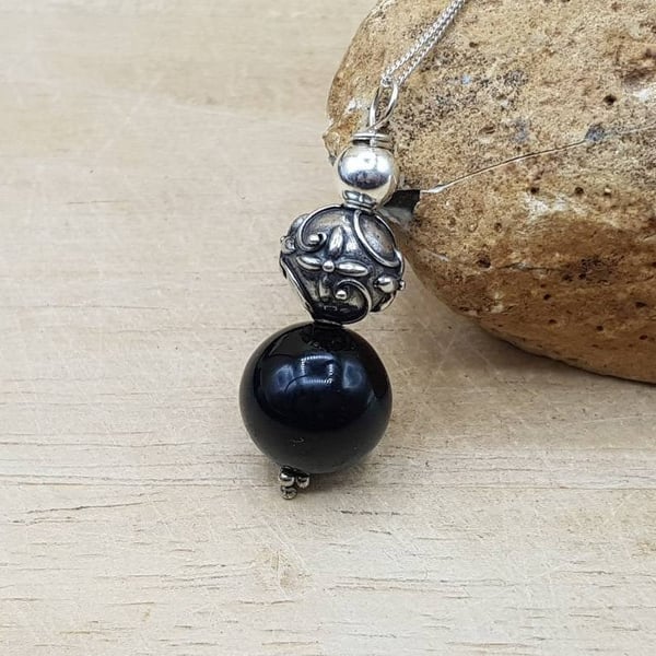 Black Onyx sphere Pendant necklace. December birthstone. Reiki jewelry. 