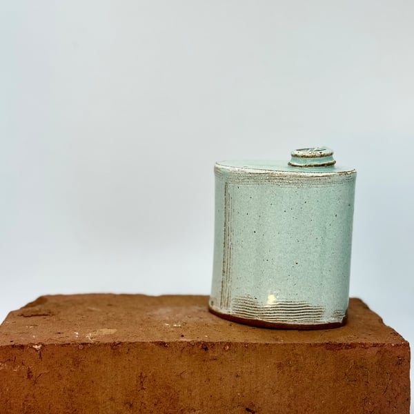 Hand built blue-green bud vase. No 2