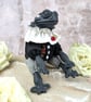 'Rospo', a black porcelain and textile frog imp.