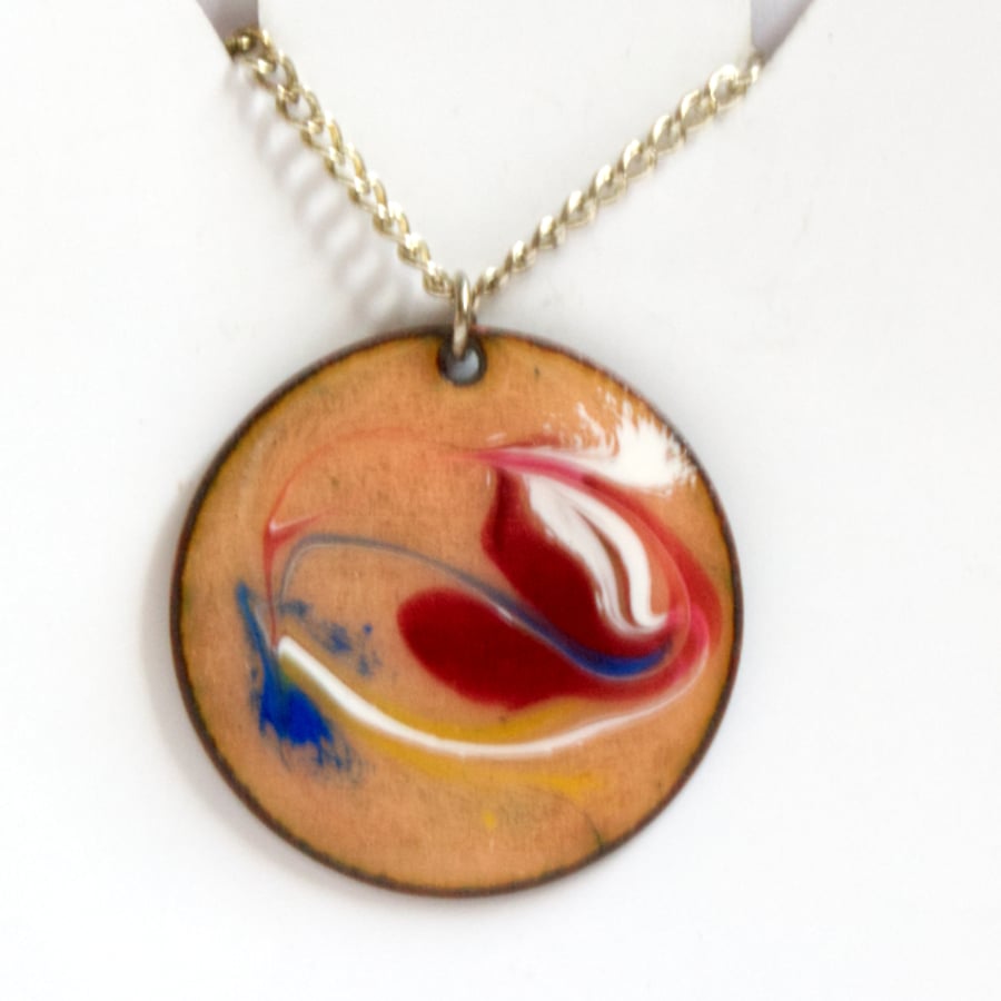 red, white and blue scrolled pendant
