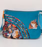 Blue handbag with sleeping cats and flowers 