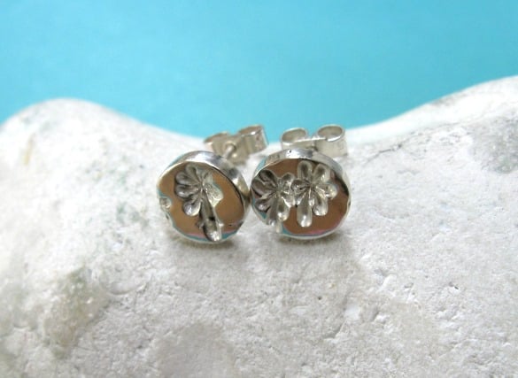 Fine silver stud earrings with dandelion seed imprint