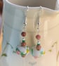 Dangle earrings with lampwork beads, white, pink and green, plus silver hooks - Image 2