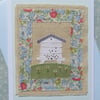 A Little Beehive hand-stitched card with embroidered bees and flowers