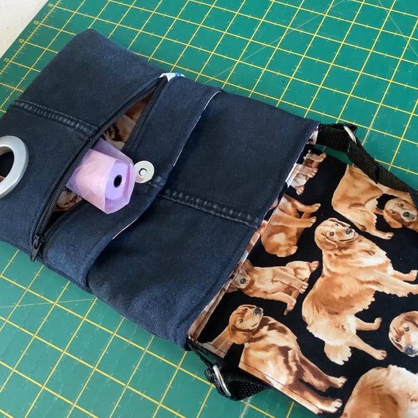 Blue denim dog walkers bag. With poop bag dispense Cross body adjustable strap.