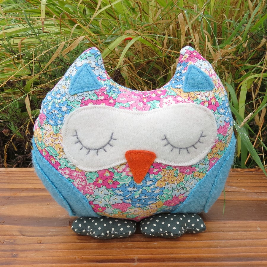 A snoozy owl doorstop made from Liberty Lawn.  Owl bookend.
