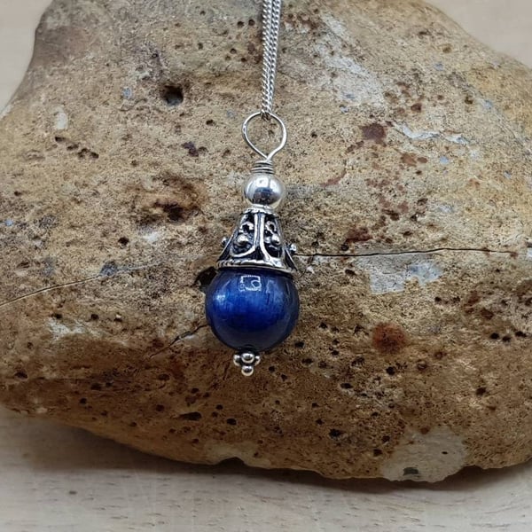 Small Blue Kyanite cone pendant necklace. Reiki jewelry