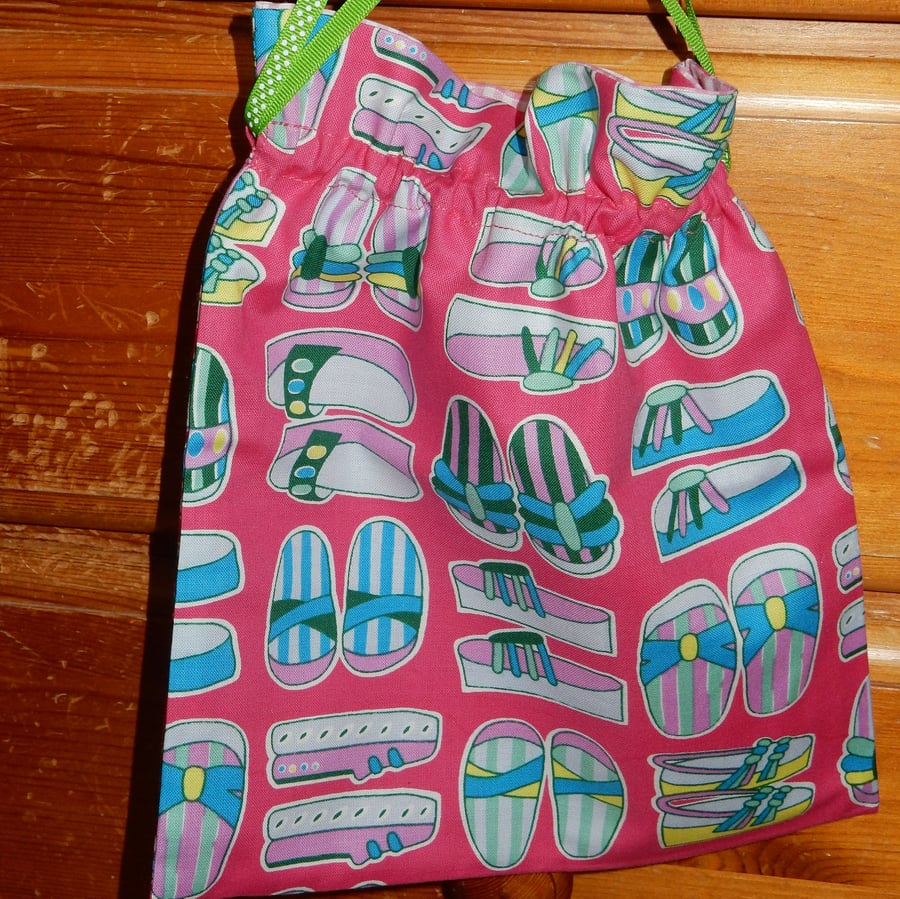 Drawstring bag with colourful shoes