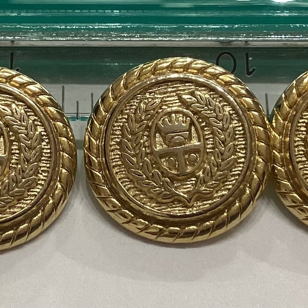 Buttons, five,gold tone, metallic, decorated.