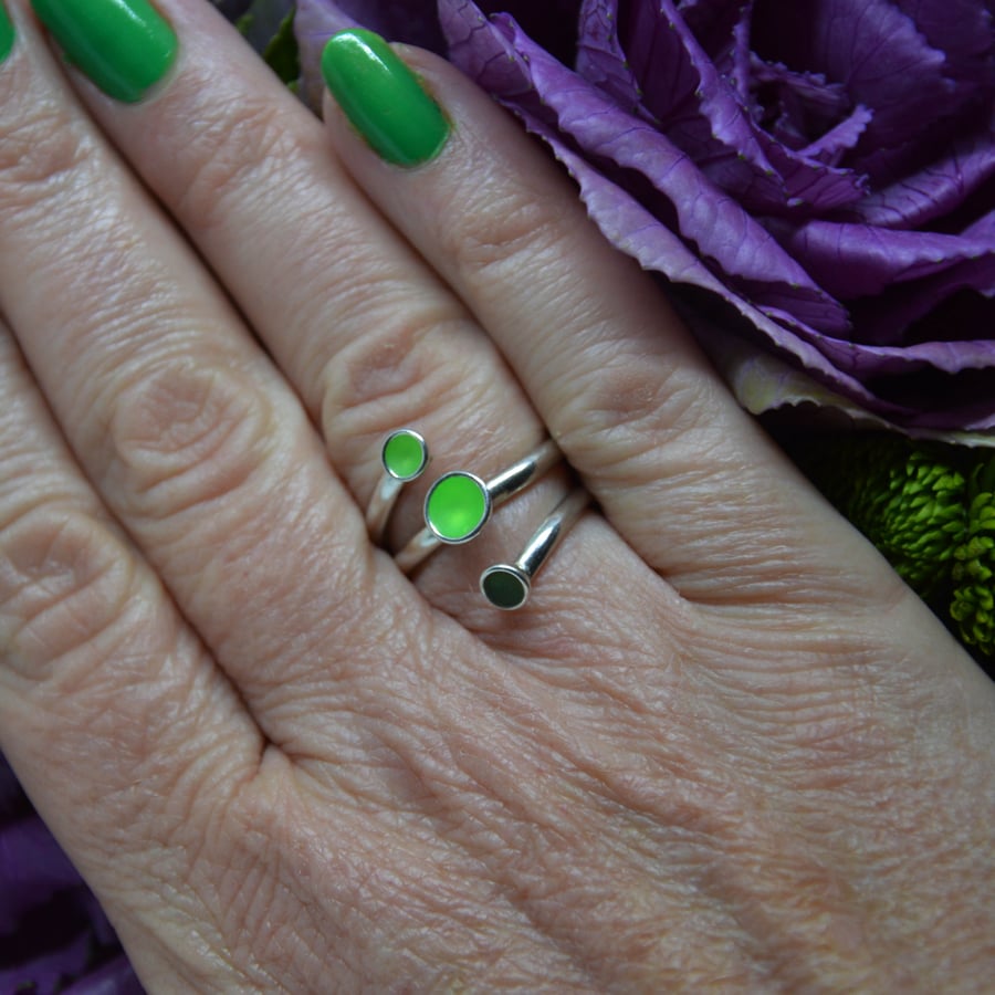 Sterling silver and florescent lime green enamel adjustable wrap ring.