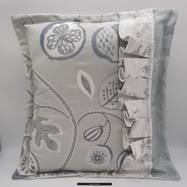 White and pale green embroidered frilled 18" feature cushion.  