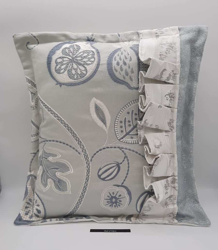 White and pale green embroidered frilled 18" feature cushion.  