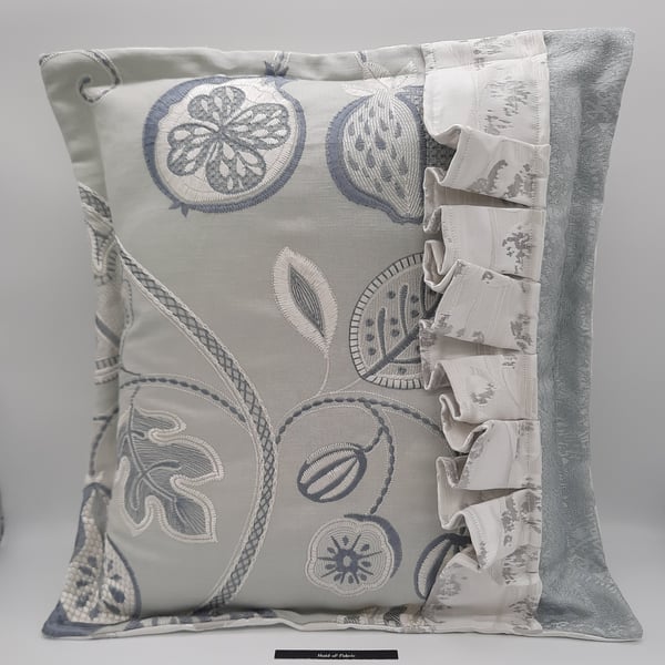 White and pale green embroidered frilled 18" feature cushion cover. 