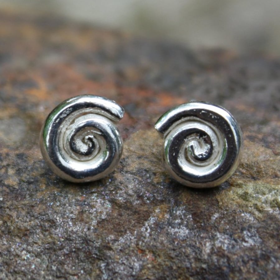 sterling silver ammonite stud earrings.