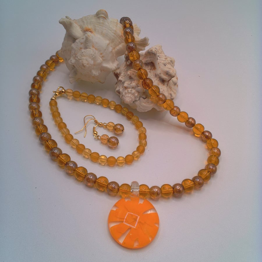 Topaz and Gold Coloured Glass Bead Jewellery Set with an Orange Glass Pendant