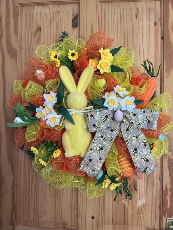 Yellow rabbit with yellow and orange deco mesh Easter door wreath