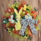 Yellow rabbit with yellow and orange deco mesh Easter door wreath