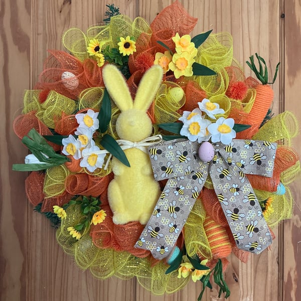 Yellow rabbit with yellow and orange deco mesh Easter door wreath