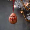 Willie the ceramic pink eggman hanging decoration. 