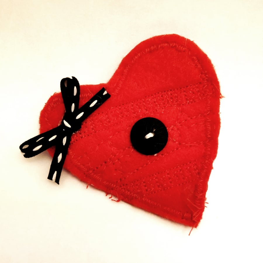 Handmade felt heart brooch with black bow