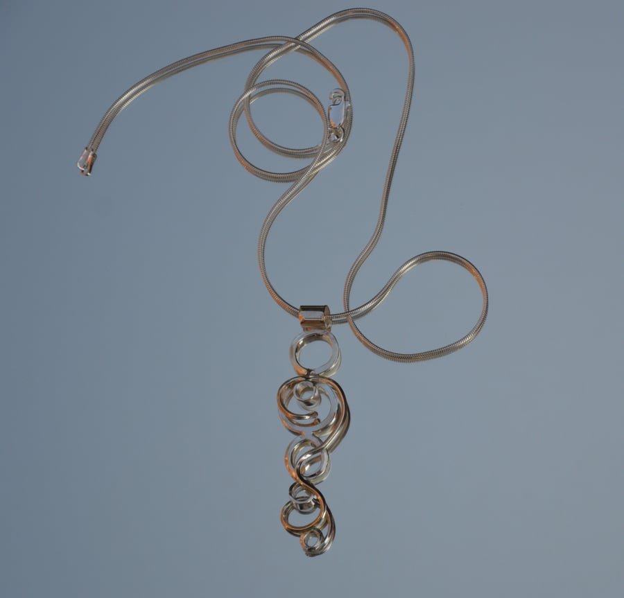 Sterling silver twisted pendant.