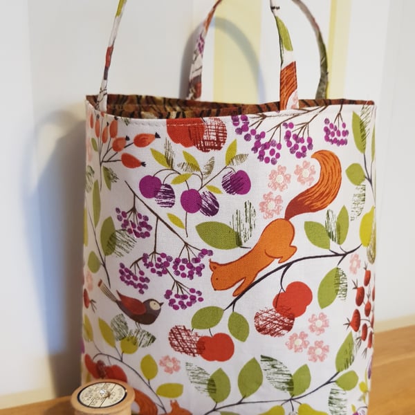 Reusable fabric gift bag: red squirrel after berries