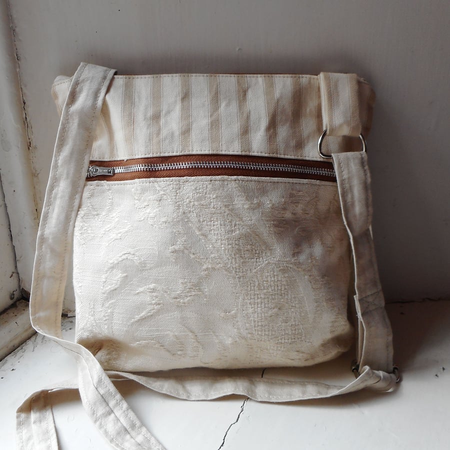 Striped fabric crossbody bag with zipped pocket 