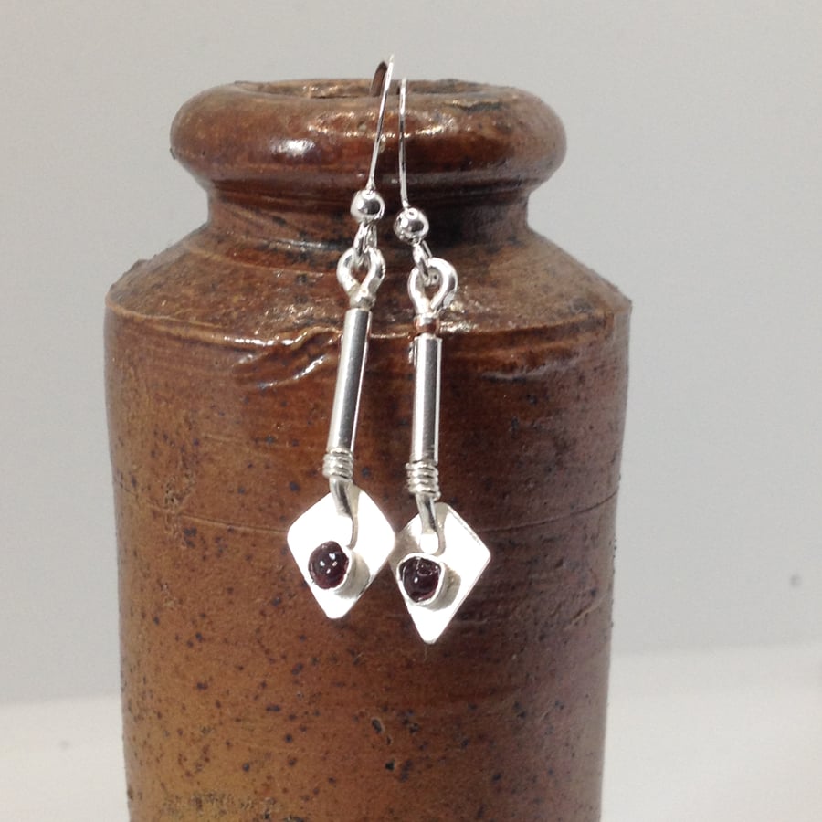 Tiny trowel earrings with Thames garnet