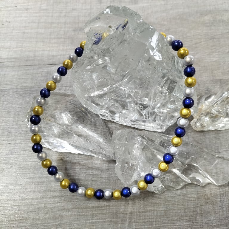 AL149C  Blue, yellow and silver miracle bead elasticated anklet, 11.5"