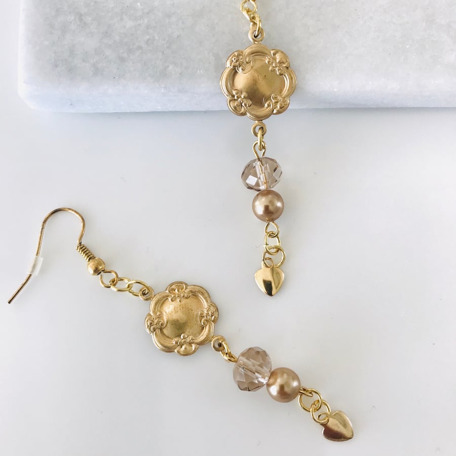 Vintage style gold earrings with glass beads and hearts