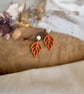 Autumn Minimalist Cutout Metallic Orange Polymer Clay Leaf Earrings - Image 2