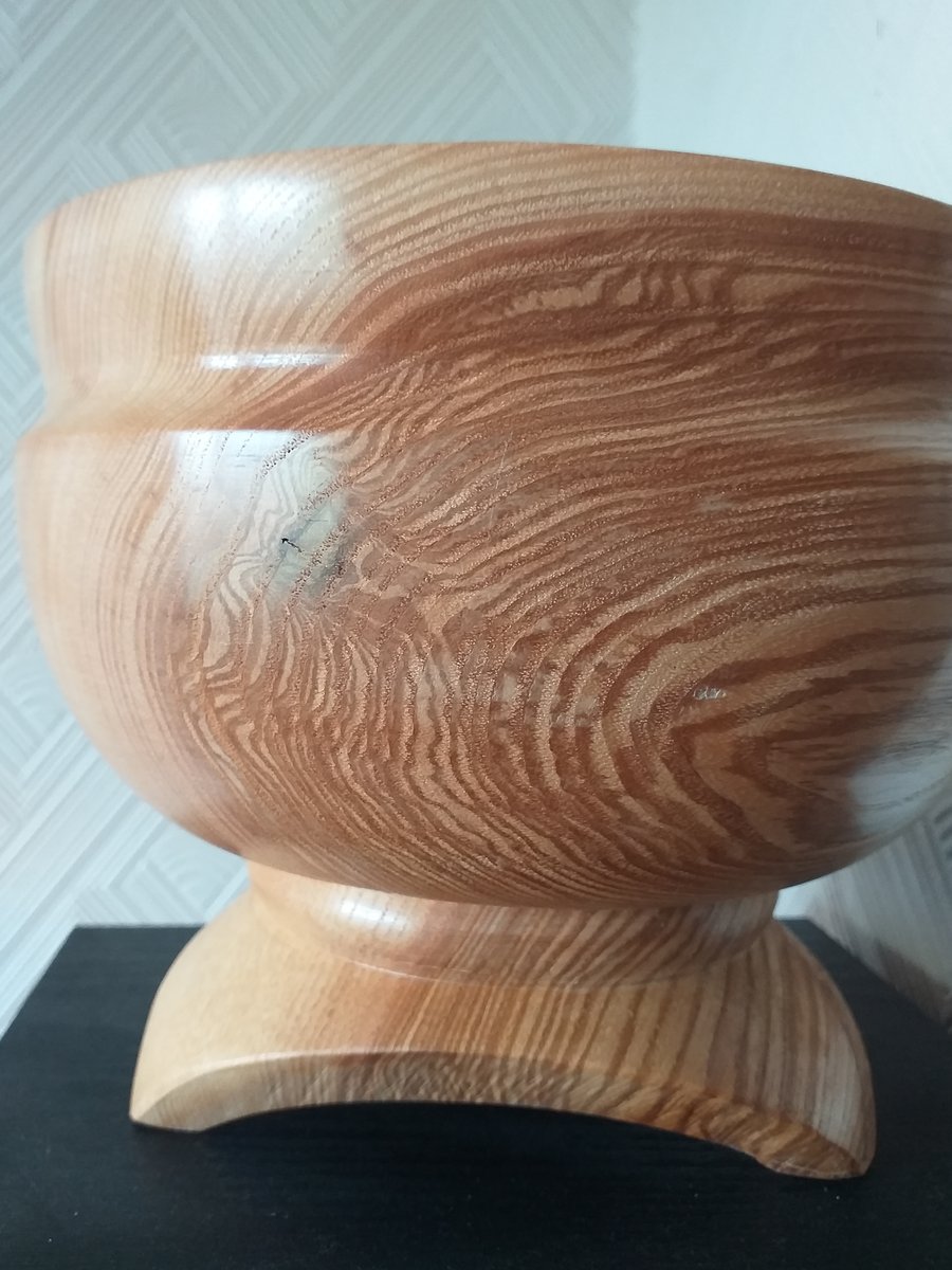 Large bowl sat on a plinth