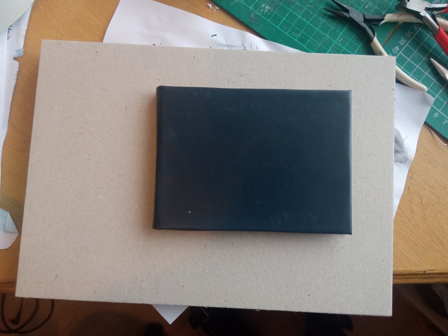 Slim leather bound notebook white laid paper 