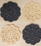Set of 4 crochet coasters in denim blue and cream