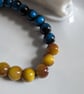 Blue and yellow bracelet with turtle - Image 3