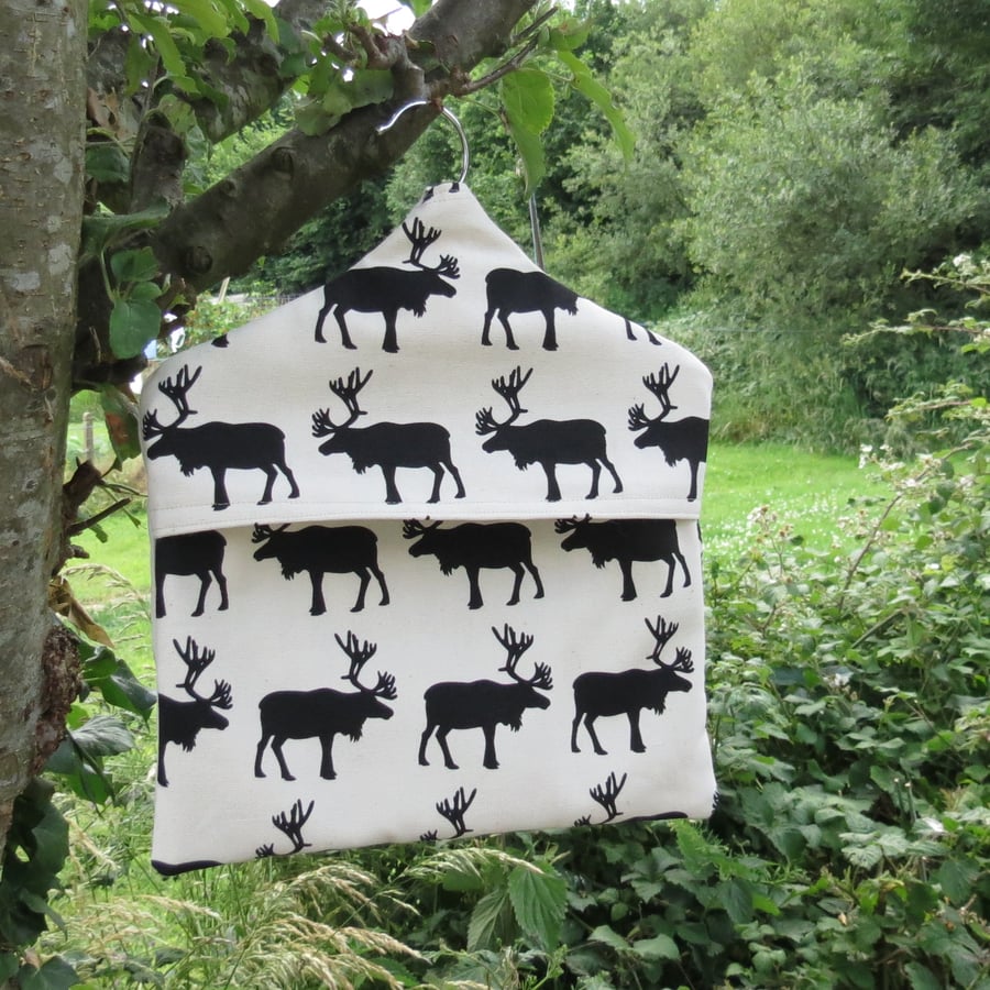 Peg bag.  A peg bag with a reindeers design.  Peg Storage.