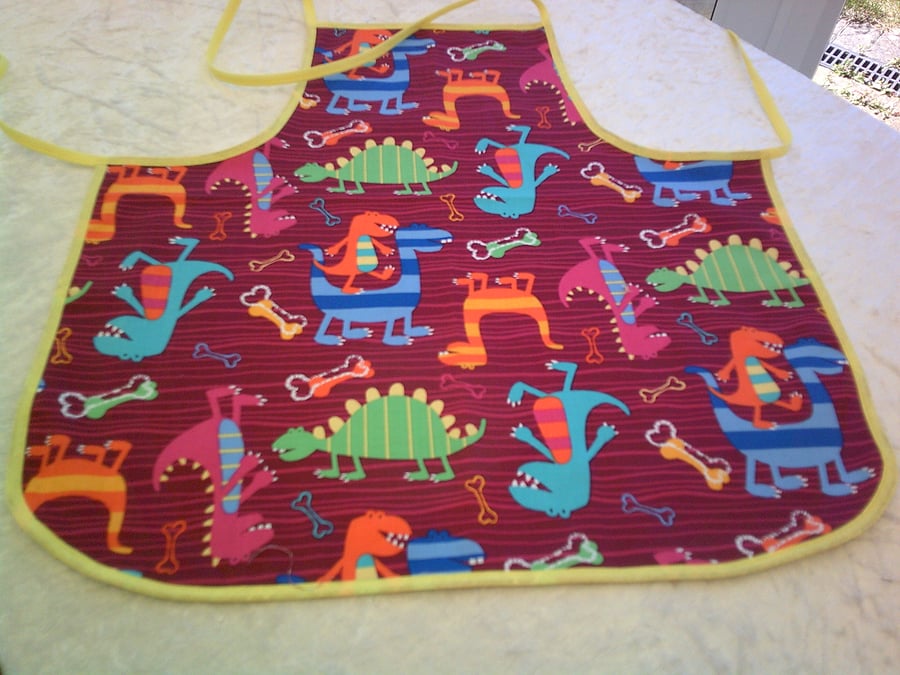 Baby Apron with Colourful Comical Dinosaurs