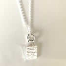 Hammered square pendant 
