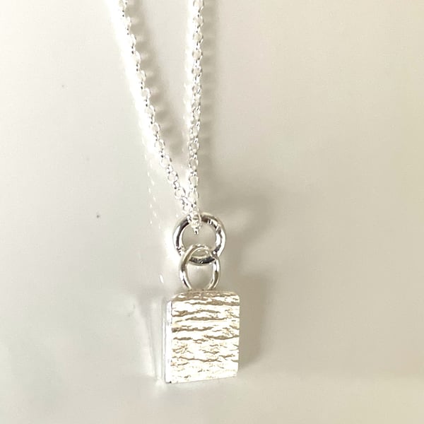 Hammered square pendant 